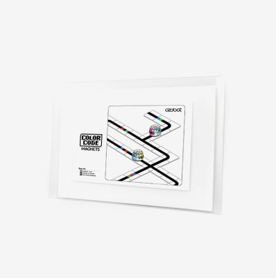 Ozobot Color Code Magnets Base Kit with white tiles and printed black tracks used for coding with Ozobot robots.