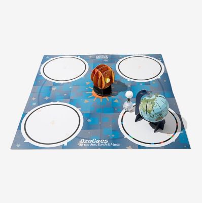 Ozobot STEAM Kit activity mat showing 3D Sun, Earth, Moon models for hands-on solar system learning and coding exploration.