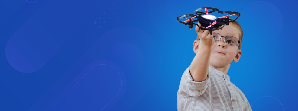 Young boy flying a STEM educational drone, exploring hands-on learning. Available at AtlabShopOnline KSA